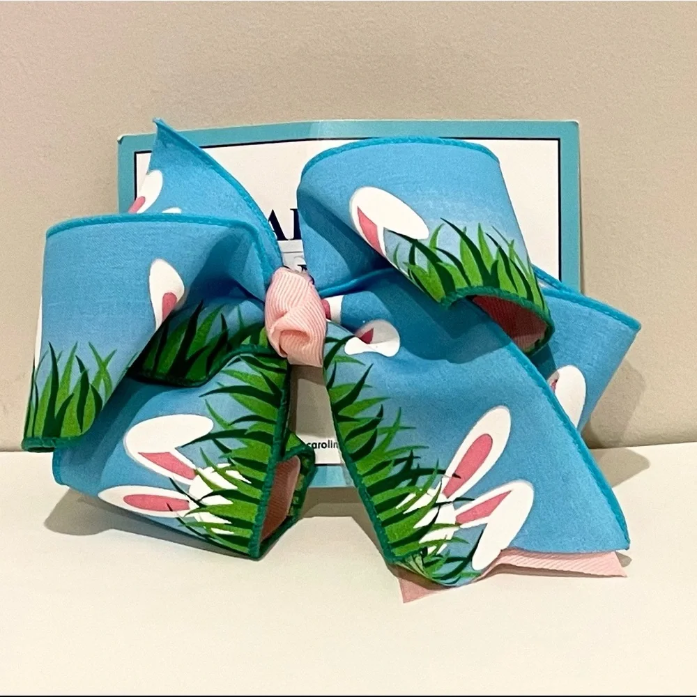 Large, colorful, double hair bow with bunny ears